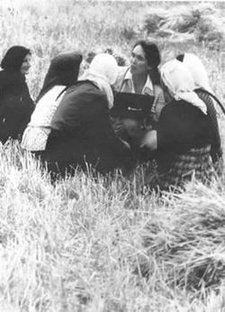 Erna Bennett talking with farmers in the mountains of Greece while collecting wheat varieties during her time at FAO