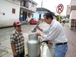 Selling milk in Colombia.